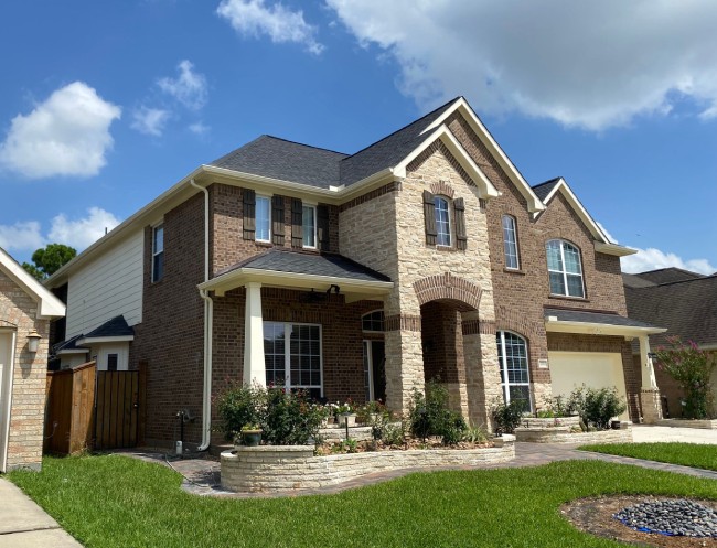 Custom home, this house remplace the re-roof, remodeling for Outside.